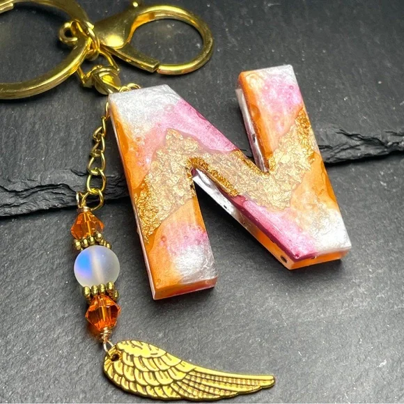 Orange, Gold and Pink Initial Letter “N” Boho Keychain With Angel Wing Charm - Picture 4 of 8
